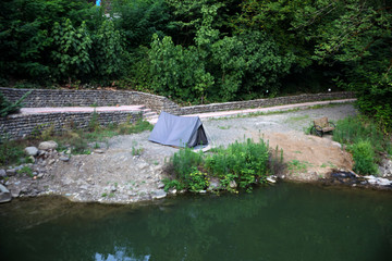 tents on the edge of the river