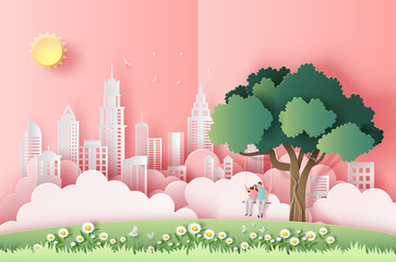Cute couple sitting on a swing under a tree in a big city, pop up card, paper art style, flat-style vector illustration.
