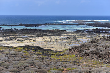 White sandy beach of Caleton Blanco on the west side of Lanzarote, Canary Islands, Spain