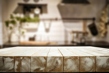 Fototapeta na wymiar White wooden table and kitchen furniture 