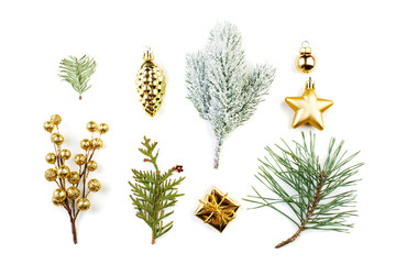 Christmas gift, golden berries, baubles and green fir branch isolated on white background
