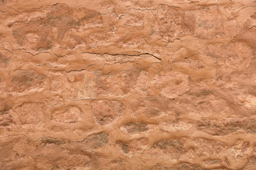 A fragment of the wall is an amphitheater of red sandstone