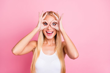 Photo of pretty lady showing okey symbol near eyes making specs shape observe sale prices wear...