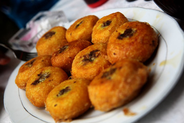 Potato patties stuffed with beef. Rustic style. Close Up