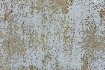 Texture of a concrete wall with cracks and scratches which can be used as a background