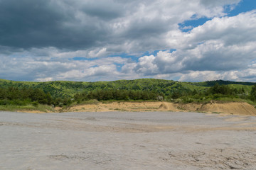 global warming causes dramatic climate change - green area turns into arid soil