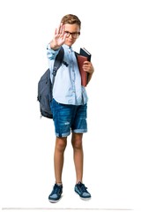 Full body of Student boy with backpack and glasses making stop gesture with her hand on isolated...