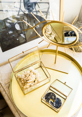 Luxurious home decoration in gold tones, real interior decor details