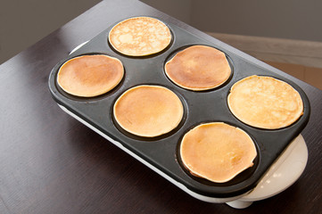 Pancake on a plate close up, food background top view