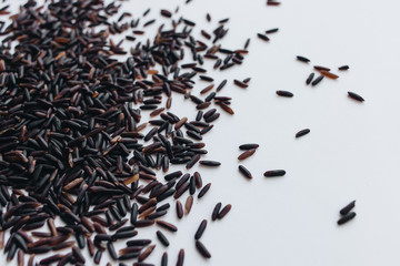 Pile of raw black rice, macro 