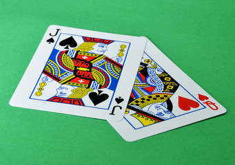 playing cards on green background