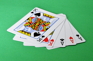 playing cards on green background