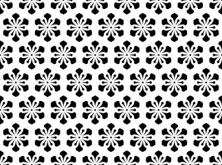 Flower geometric pattern. Seamless vector background. White and black ornament