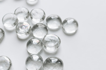 Scattered crystals on white background, beautiful gems