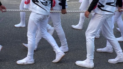 KISHIWADA, OSAKA, JAPAN - 15 SEPTEMBER 2019 : Crowd of people at DANJIRI MATSURI (Festival). “Danjiri” are the large wooden floats, or portable shrines, that are pulled around. Slow motion shot.
