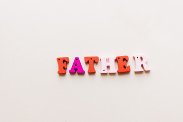 Colorful wooden letters, FATHER lettering