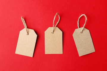 Cardboard tags with space for text on red background