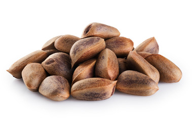 Obraz premium Cedar pine nuts isolated on white background.