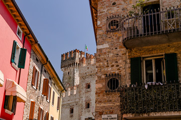 Fototapeta na wymiar Castle on the island of sirmione in italy. Travel in Europe. Lake and country architecture.