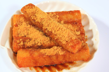 Dry pork is covered with Chinese fried tofu