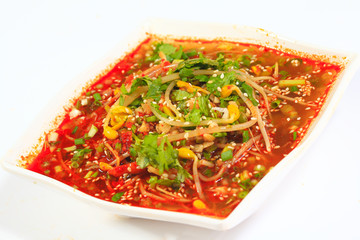 Yellow bean sprouts Vermicelli red soup in white porcelain bowl