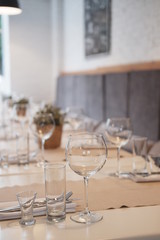 Fototapeta na wymiar served table in a cafe, empty glasses, interior