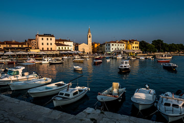 Picturesque Village Fazana In Croatia With Old Church And Boats In Harbor