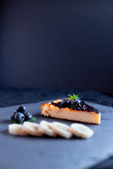 Yogurt pie with blueberry jam, banana and mint