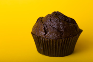 chocolate cake on yellow background