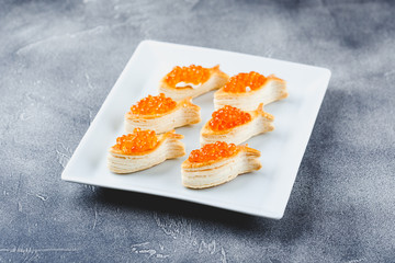 Delicious appetizer with red caviar.