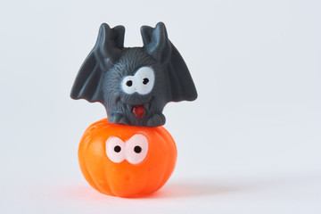 A bat on top of cute pumpkin