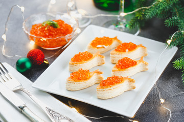 Delicious appetizer with red caviar.