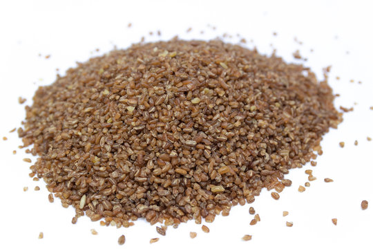 Bulgur. Durum wheat. Healthy lifestyle concept. Isolated on a white background.
