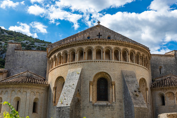 Fototapeta premium Medieval buildings of the Abbey of Saint-Guilhem-le-Desert in a small town in the south of France. It's classed as a French Historical Monument.