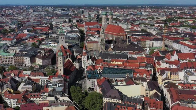 Aerial view of cityscape of Munich, Frauenkirche cathedral and Marienplatz square with iconic town hall in historic city center, capital city of Bavaria from above - Germany, Europe