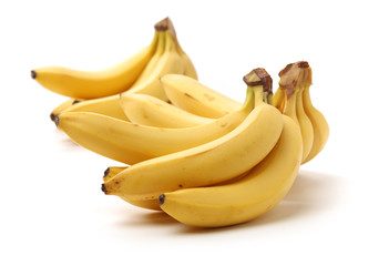 Fresh ripe bananas on white background 