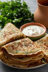 Savory pancakes (crepes) with parsley.
