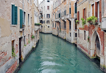 In Venice. View of the canal between old houses
