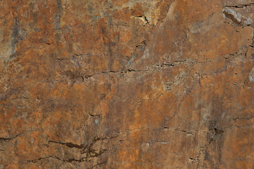 Rocks carved by sea water erosion. Stones texture and background. Rock texture