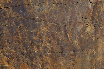 Rocks carved by sea water erosion. Stones texture and background. Rock texture
