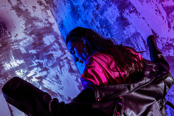 Nice woman is holding her hands up