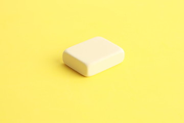 white eraser on color background