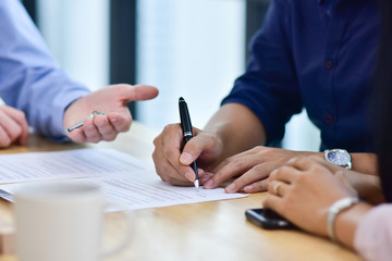 Close up People are signing house purchase contracts