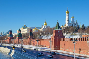 View of the Kremlin embankment and the Moscow Kremlin on a Sunny winter day. Moscow, Russia