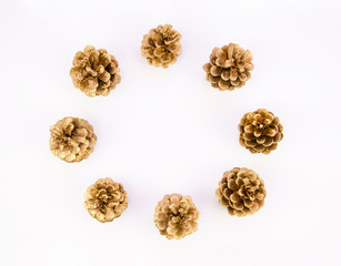 Pinecones circle winter composition with copy space. Top view mockup isolated on white background