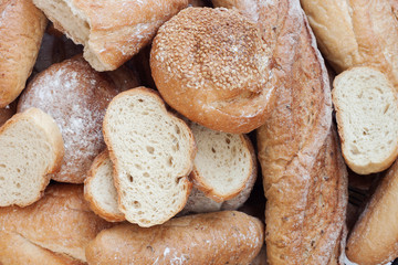 Freshly scented bread piled together on the table