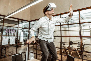 Kind male person turning on his imagination