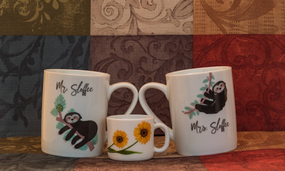 Coffee cups with designs and colorful background