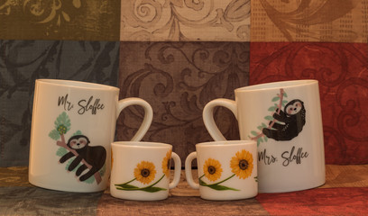 Coffee cups with designs and colorful background