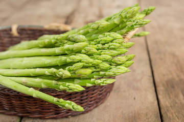 Asparagus with a wooden background